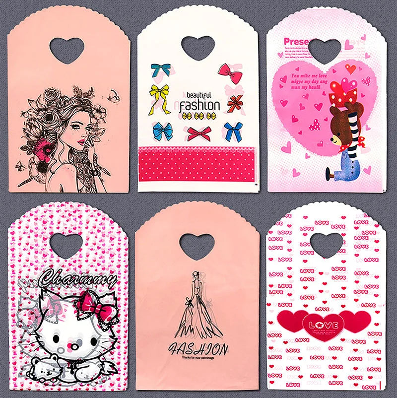 50pcs/lot Various Patterns Jewelry Plastic Bag Heart-Shaped Oval Handles Mini Gift Packing Bag Store Small Shopping Bags