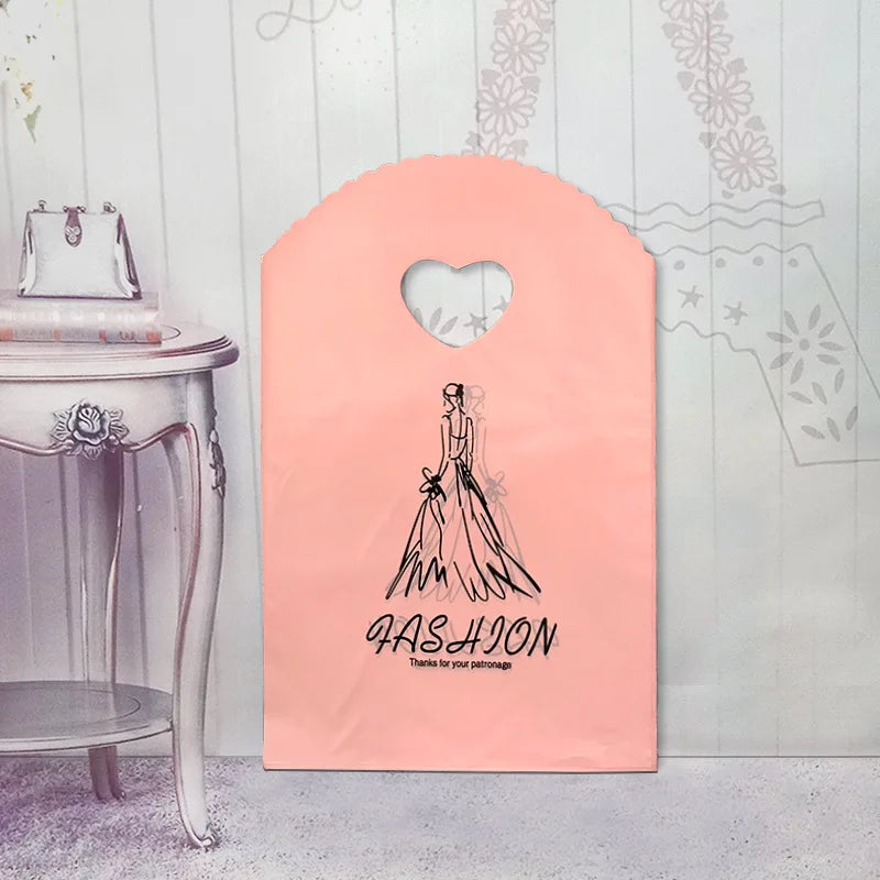 50pcs/lot Various Patterns Jewelry Plastic Bag Heart-Shaped Oval Handles Mini Gift Packing Bag Store Small Shopping Bags