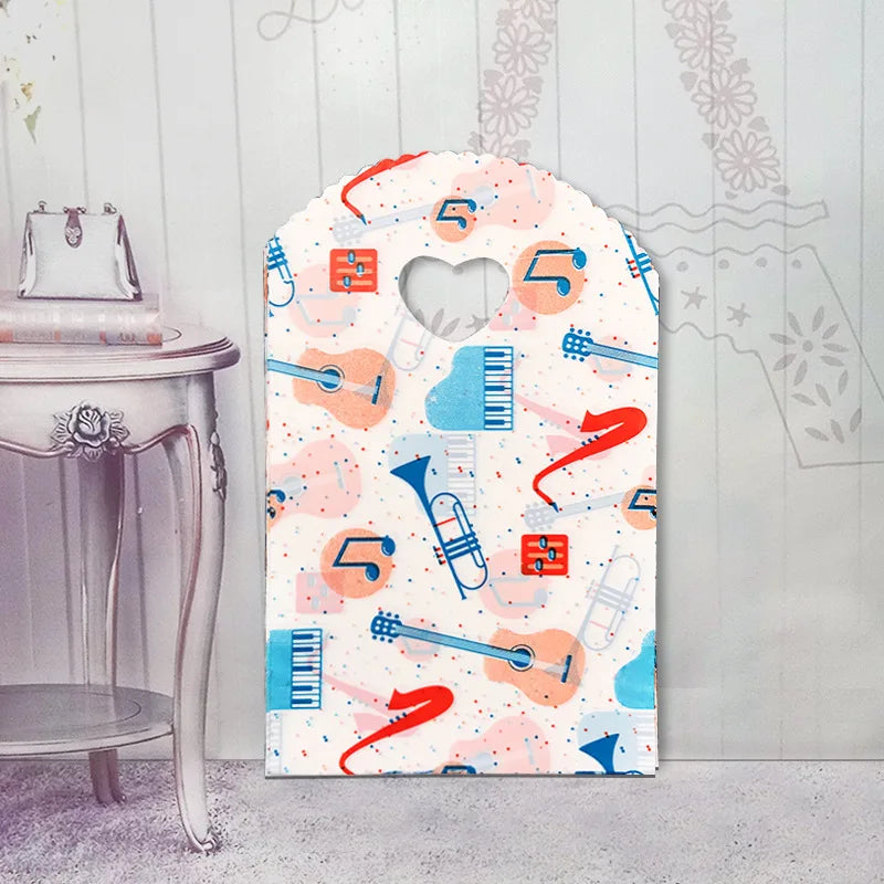 50pcs/lot Various Patterns Jewelry Plastic Bag Heart-Shaped Oval Handles Mini Gift Packing Bag Store Small Shopping Bags