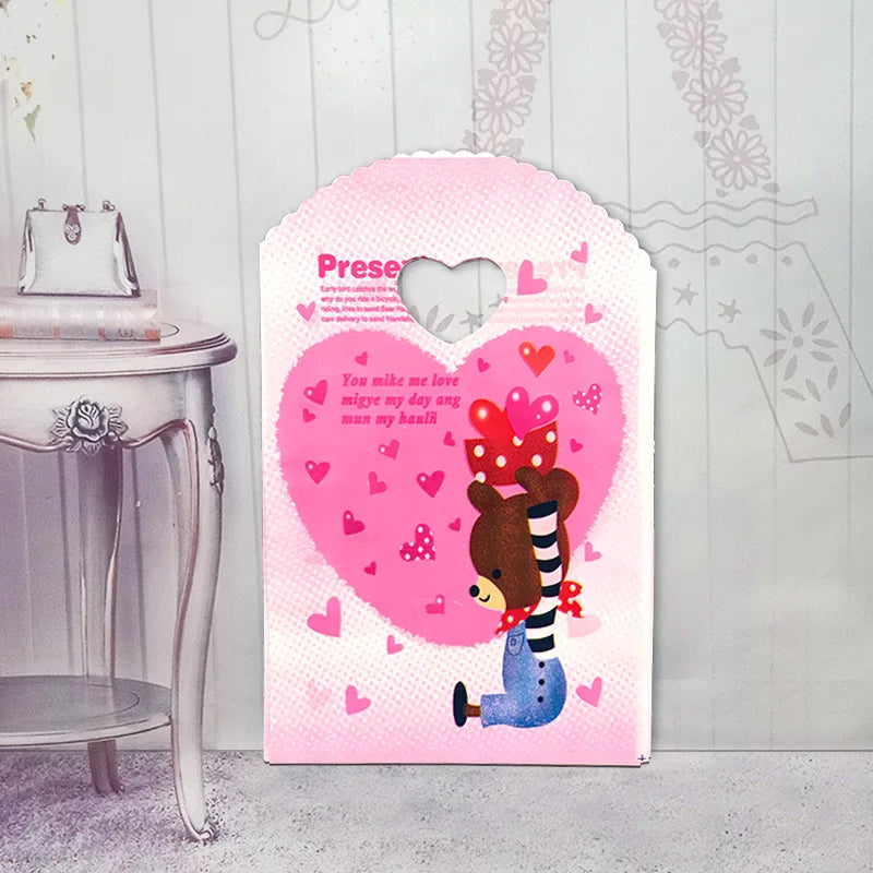 50pcs/lot Various Patterns Jewelry Plastic Bag Heart-Shaped Oval Handles Mini Gift Packing Bag Store Small Shopping Bags