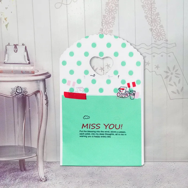 50pcs/lot Various Patterns Jewelry Plastic Bag Heart-Shaped Oval Handles Mini Gift Packing Bag Store Small Shopping Bags