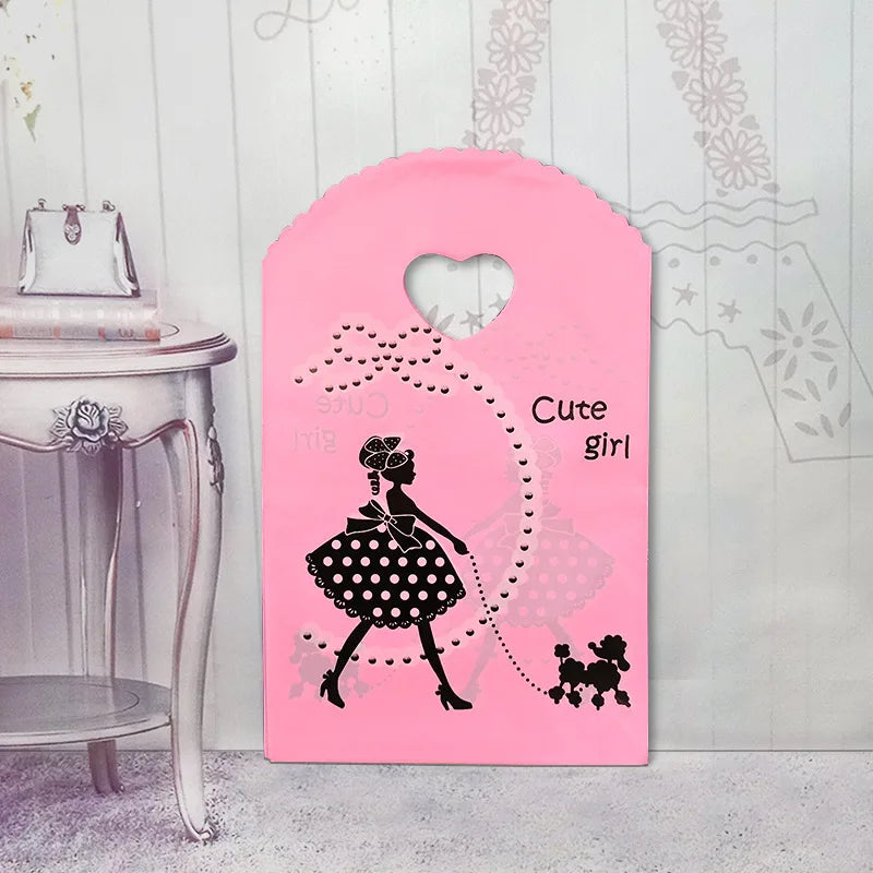 50pcs/lot Various Patterns Jewelry Plastic Bag Heart-Shaped Oval Handles Mini Gift Packing Bag Store Small Shopping Bags