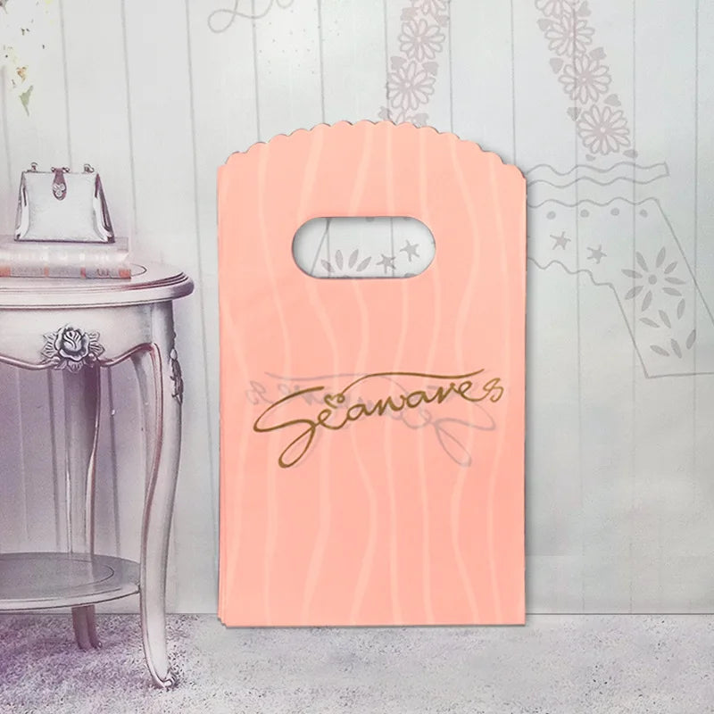 50pcs/lot Various Patterns Jewelry Plastic Bag Heart-Shaped Oval Handles Mini Gift Packing Bag Store Small Shopping Bags