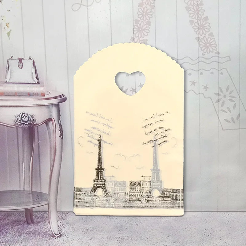 50pcs/lot Various Patterns Jewelry Plastic Bag Heart-Shaped Oval Handles Mini Gift Packing Bag Store Small Shopping Bags