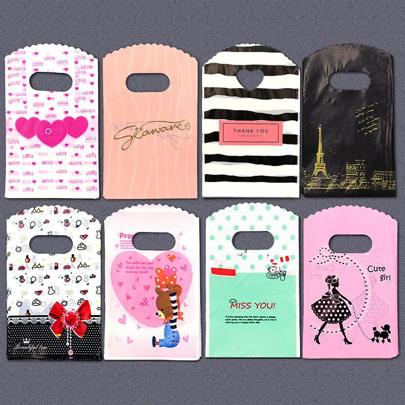 50pcs/lot Various Patterns Jewelry Plastic Bag Heart-Shaped Oval Handles Mini Gift Packing Bag Store Small Shopping Bags