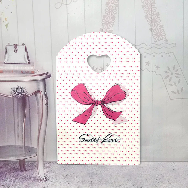 50pcs/lot Various Patterns Jewelry Plastic Bag Heart-Shaped Oval Handles Mini Gift Packing Bag Store Small Shopping Bags