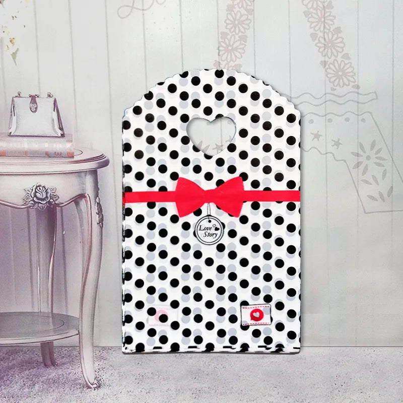 50pcs/lot Various Patterns Jewelry Plastic Bag Heart-Shaped Oval Handles Mini Gift Packing Bag Store Small Shopping Bags