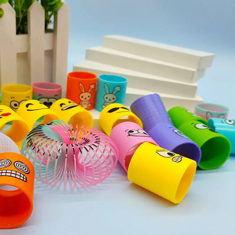12Pcs Neon Rainbow Plastic Smile Magic Spring Toys for Children Birthday Party Favors Piñata Fillers Carnival Prizes Goodie Bag