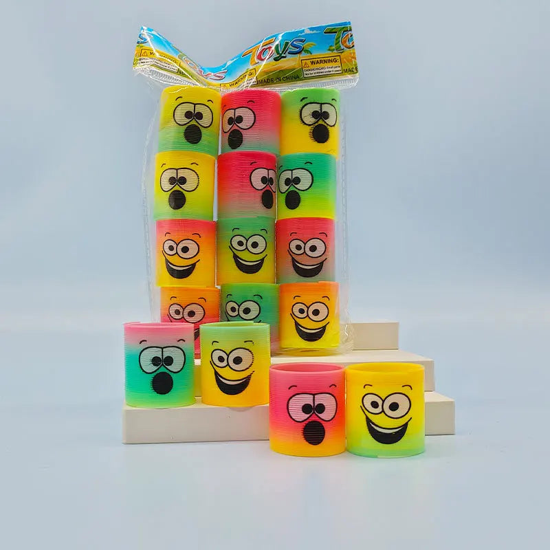 12Pcs Neon Rainbow Plastic Smile Magic Spring Toys for Children Birthday Party Favors Piñata Fillers Carnival Prizes Goodie Bag